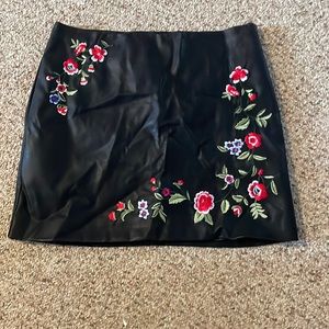 black leather with flowers skirt
